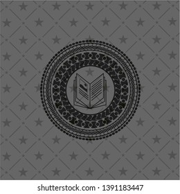 book icon inside retro style black emblem