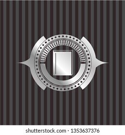 book icon inside silver badge or emblem