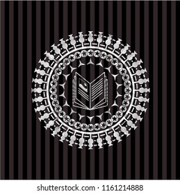 book icon inside silver shiny emblem
