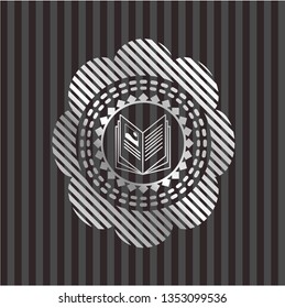 book icon inside silver shiny emblem