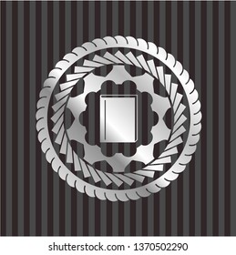book icon inside silvery badge