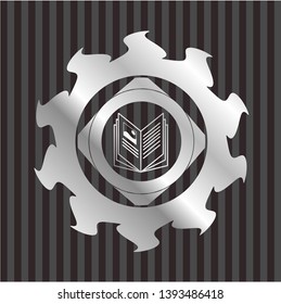 book icon inside silvery emblem