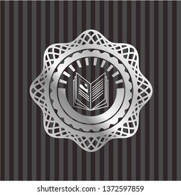 book icon inside silvery shiny emblem
