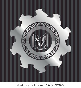book icon inside silvery shiny emblem