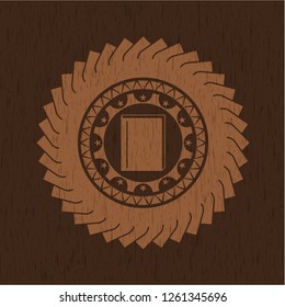 book icon inside vintage wood emblem