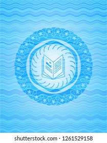 book icon inside water concept badge background.