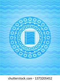 book icon inside water style badge.