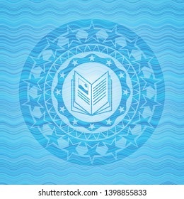 book icon inside water wave badge.