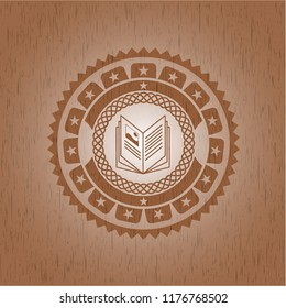 book icon inside wood emblem. Retro