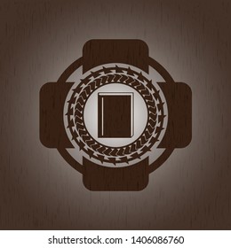 book icon inside wooden emblem