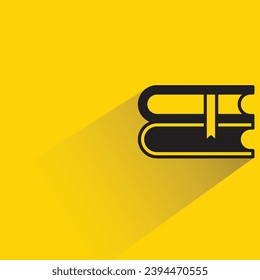 book icon with shadow on yellow background