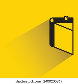 Buchsymbol auf gelbem Hintergrund