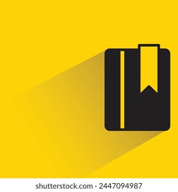 book icon with shadow on yellow background