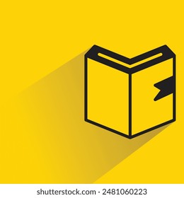 icono de libro con sombra sobre fondo amarillo