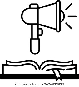 A book with a microphone on top of it