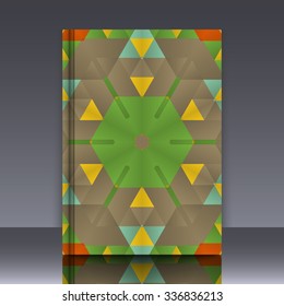 Book mockup with cover of colorful symmetrical background element with bold geometrical pattern. For wallpaper, pattern fills, web page background, surface textures for print and dalle production.