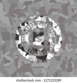 book with money symbol inside icon on grey camo texture