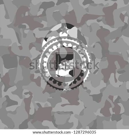 book with money symbol inside icon inside grey camouflaged emblem