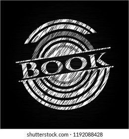 Book on blackboard