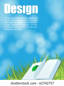 book on the grass and blue sky background