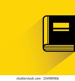 book on yellow background, flat and shadow theme