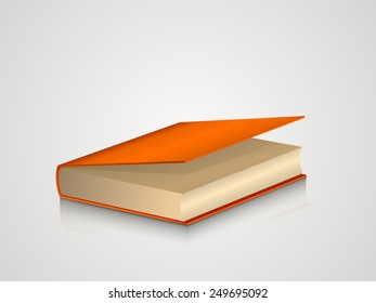 Book with orange cover isolated on grey background.