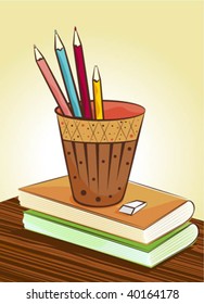 book and pencils