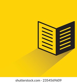 libro con sombra sobre fondo amarillo
