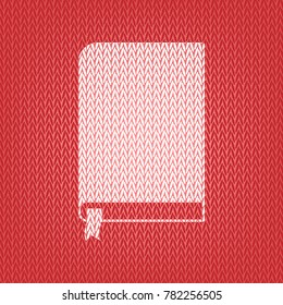 Book sign. Vector. Knitted white icon on a red knitted background.