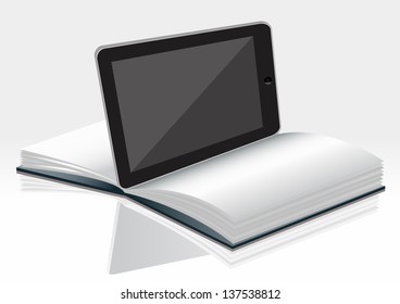 a book and tablet pc
