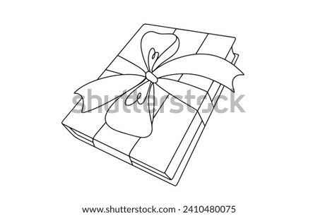 The book is wrapped in a gift ribbon with a bow. Book as a gift. International Book Giving Day. Images produced without the use of any form of AI software at any stage. 