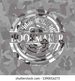 Bookmaker on grey camouflage texture