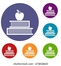 Books and apple icons set in flat circle reb, blue and green color for web