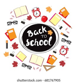 Books, glasses, autumn leaves, alarm clock and pencil. School stationery card back to school