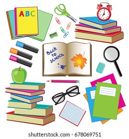Books and stationery on a white background. School items