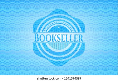Bookseller light blue water wave badge background.