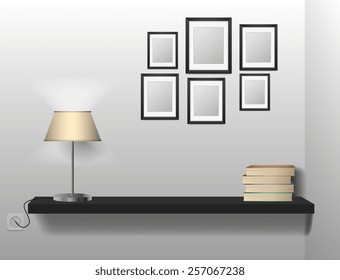 A bookshelf of books between bookends with table lamp. Space for your text.
