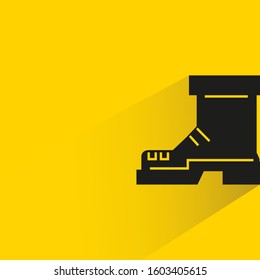 boot with drop shadow on yellow background