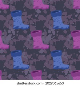 Boots against the background of stains of dirt paint. Seamless pattern.