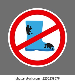 Boots in gray. Prohibited sign on a gray background. Flat design 