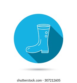 Boots icon. Garden rubber shoes sign. Waterproof wear symbol. Blue flat circle button with shadow. Vector