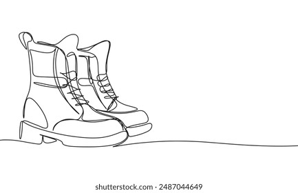 Boots one line continuous. Boots line art. Hand drawn vector art. 