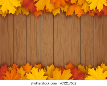 Border from fallen maple leaves on the background of a wooden vintage table surface. Realistic vector illustration.