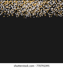 Border of gold and silver confetti on black