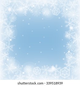 Border of various snowflakes on light blue background.