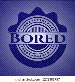 Bored emblem with jean background