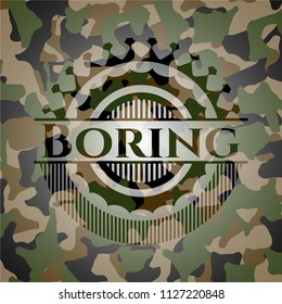 Boring written on a camouflage texture