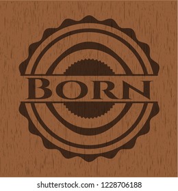 Born badge with wooden background