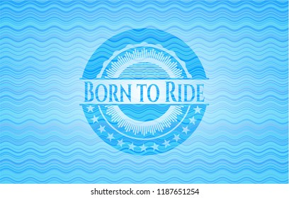Born to Ride sky blue water wave emblem.