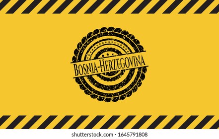 Bosnia-Herzegovina black grunge emblem with yellow background. Vector Illustration. Detailed.